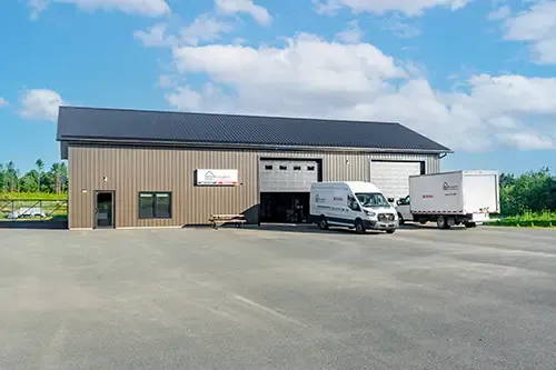 McLaughlin office with trucks